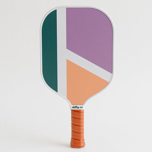 Dilly Co Carbon Fiber Pickleball Paddle with abstract court lines