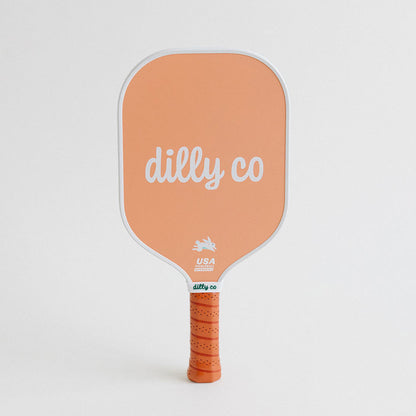 Dilly Co Carbon Fiber Pickleball Paddle with abstract court lines